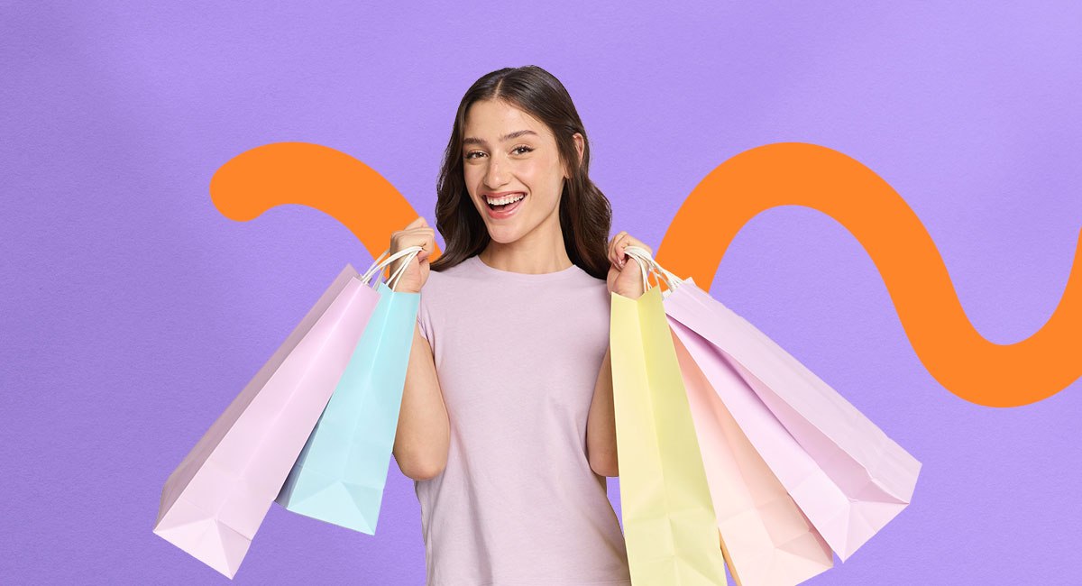 young woman holding shopping bags